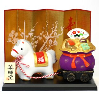 Jahrestierfigur 2026: Pferd mit Gl�cksbeutel